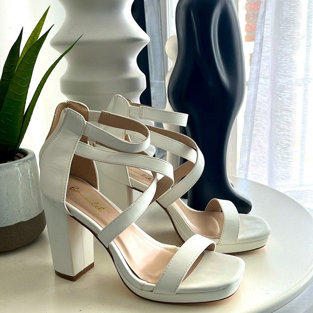White block heels in a size 6 1/2